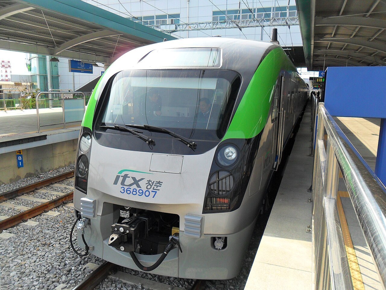 The white and green ITX-Cheongchun express train at a Gyeongchun Line platform